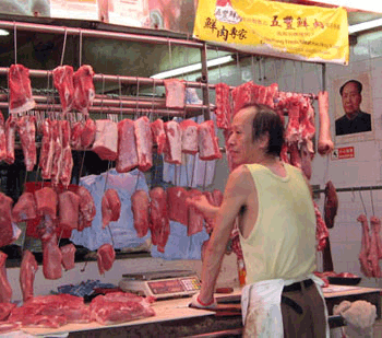Butcher at wet market hong kong