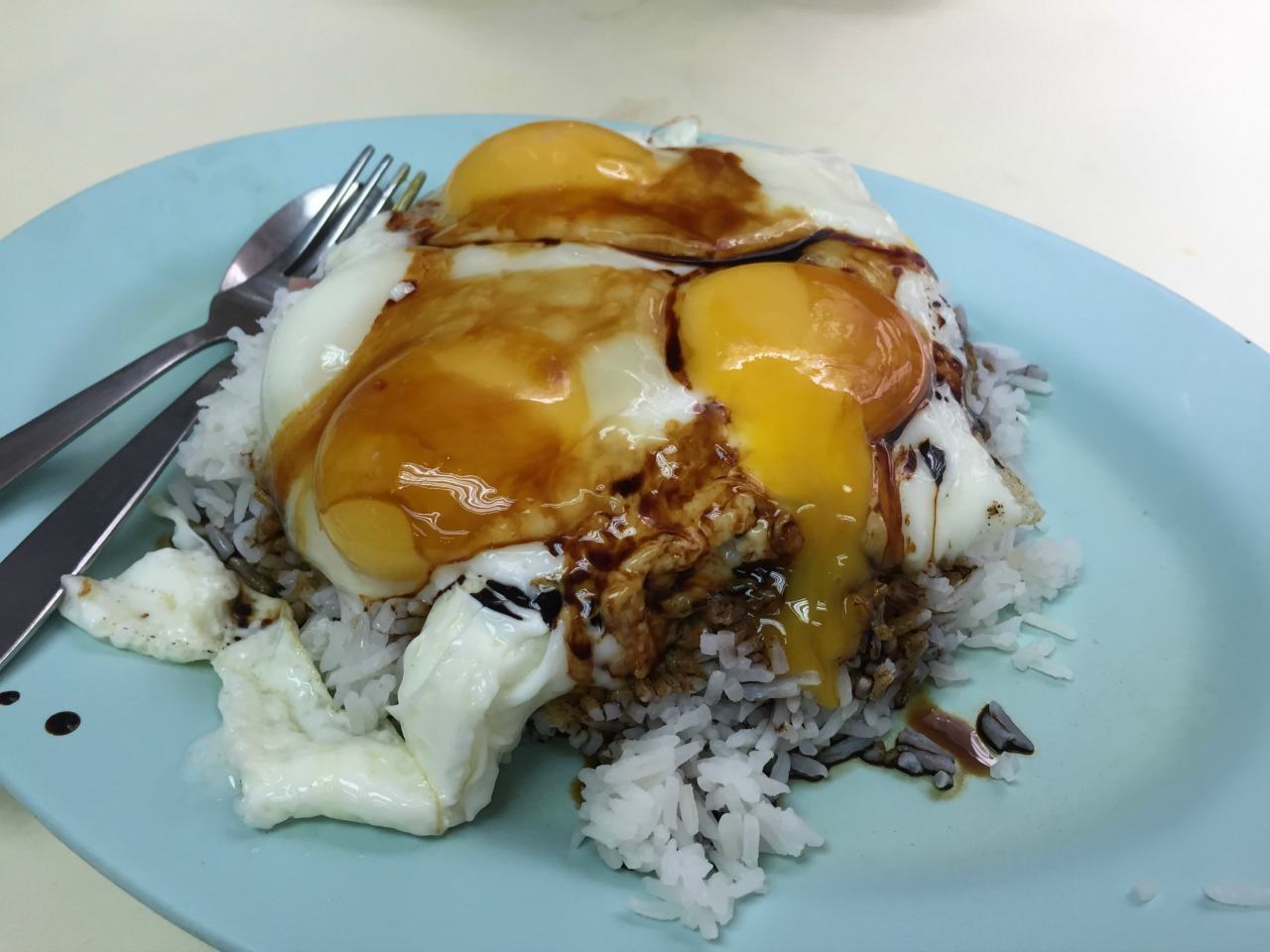 sunny-side up eggs on rice with char siu