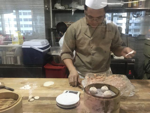 Chef preparing XLB at Cheung Lung