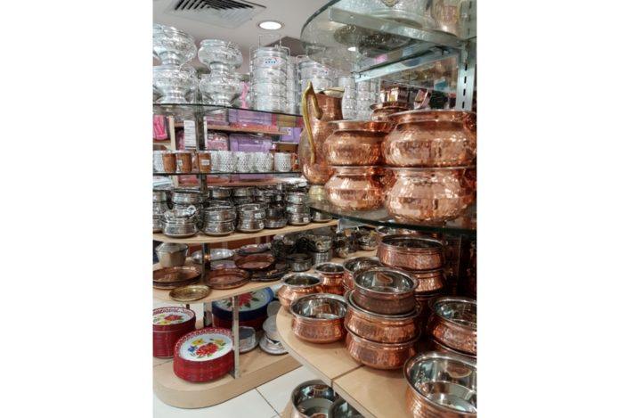 Traditional Indian serving ware on display at Mustafa