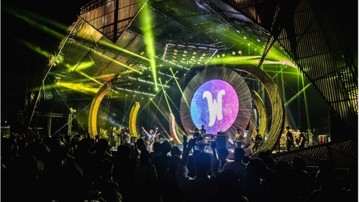 View of stage at night at Wonderfruit music festival, Thailand