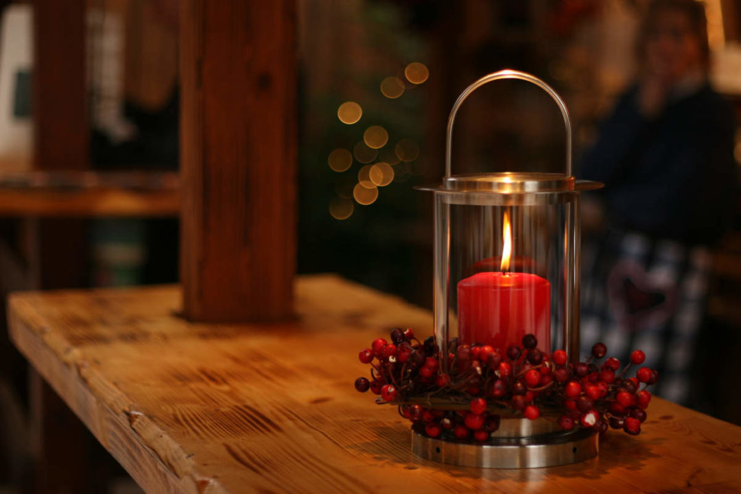 christmas candle with cranberries