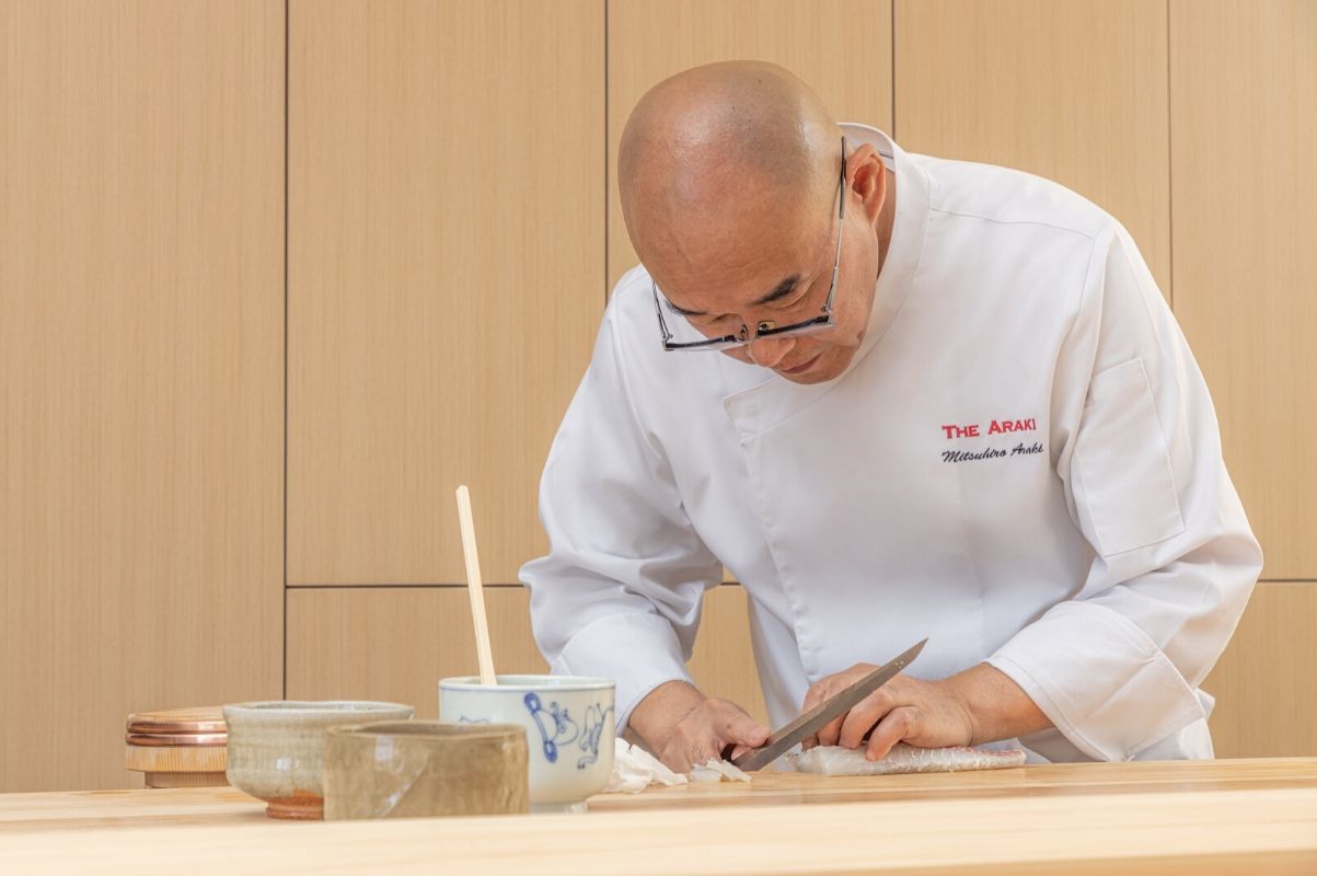 chef in action at Araki Hong Kong