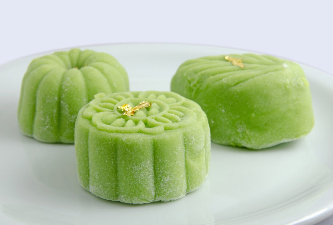 snowy green mooncake with gold leaf