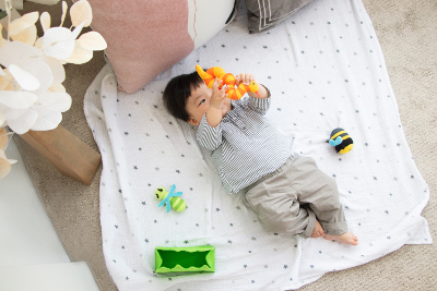 baby playing with learning toys