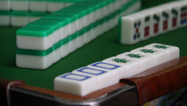 mahjong melds pong and kong on table
