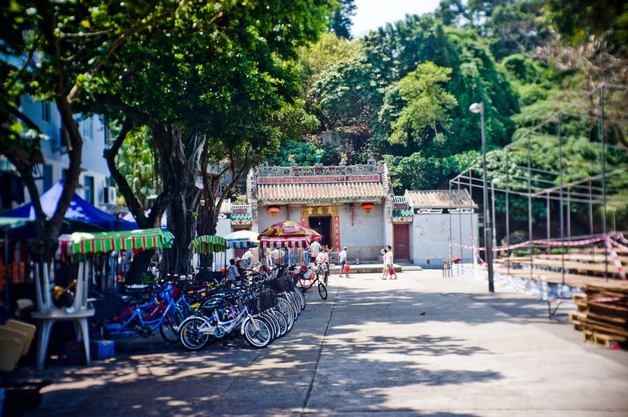 bikes lined up by a temple in cheung chau island