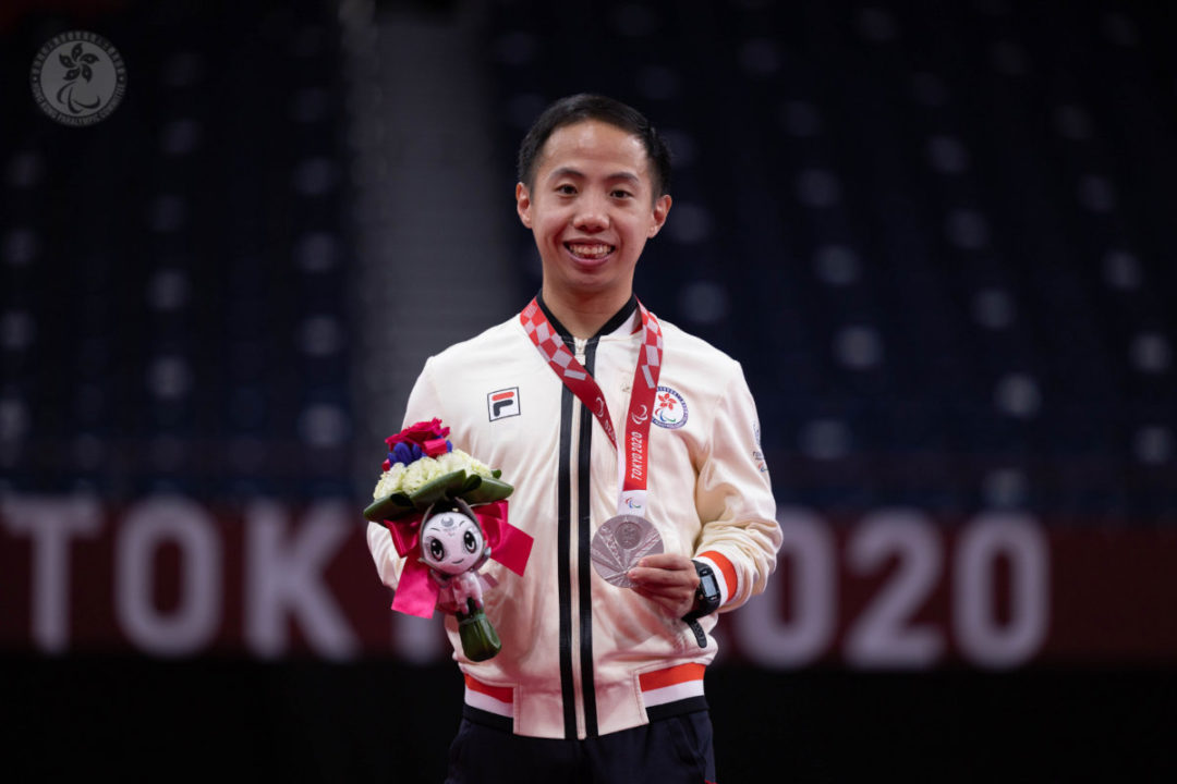 chu man kai with silver medal tokyo 2020