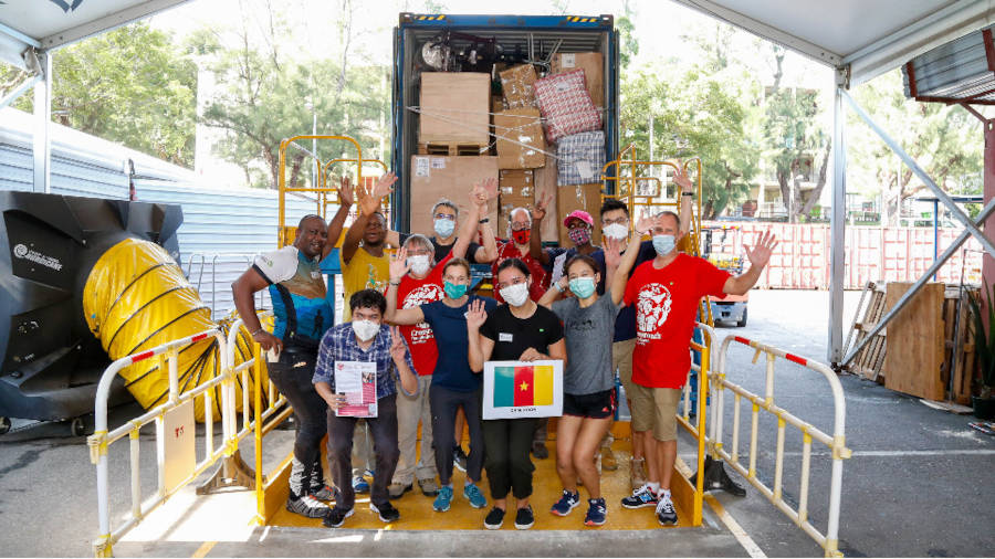 crossroads foundation volunteers with donations