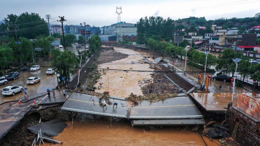 flooded river and broken bridge in henan china