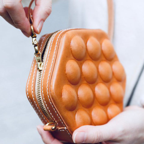grew from hands egg waffle purse