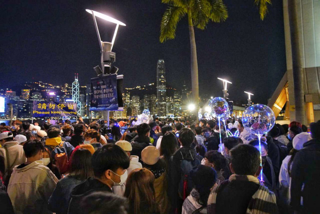 crowds in tsim sha tsui during 2021 new year countdown
