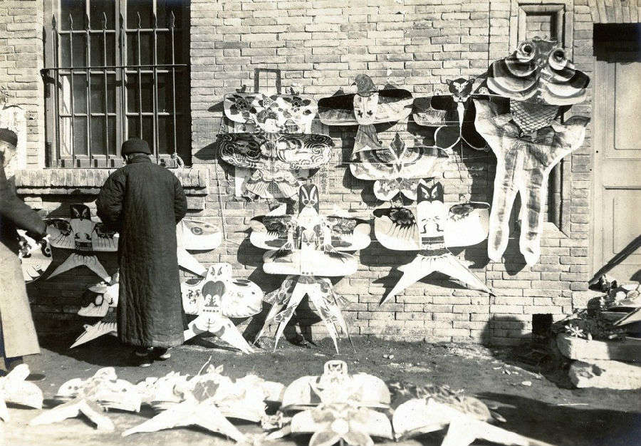 kites being sold at chinese new year in early 1900s china