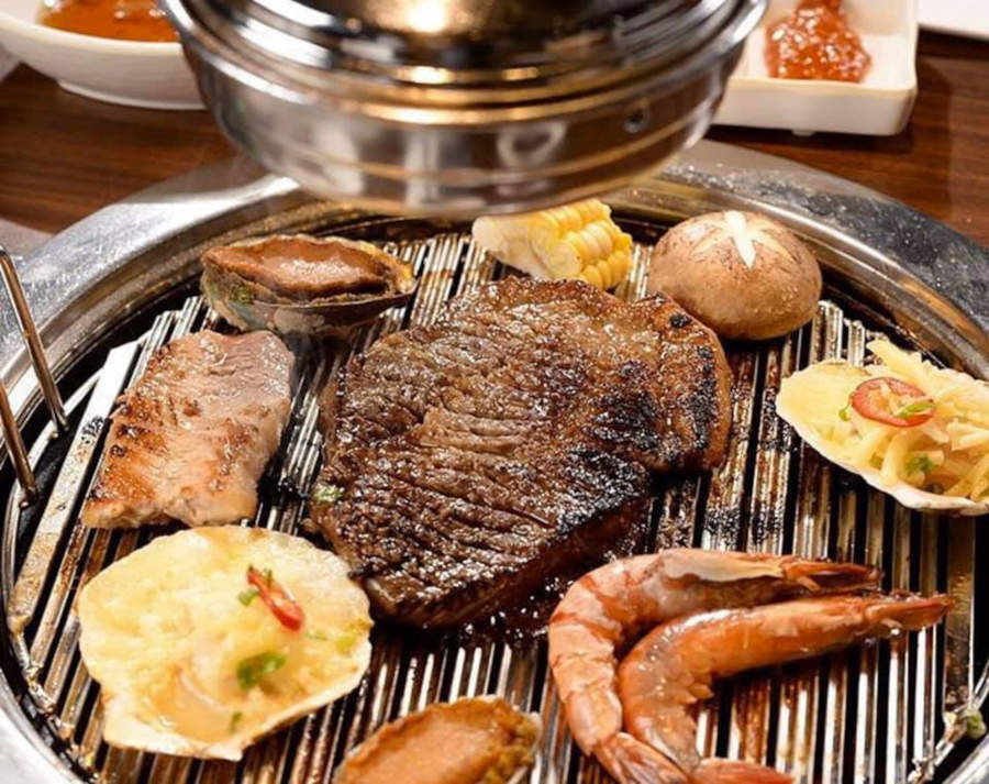 meat and seafood grilling at hancham kbbq restaurant