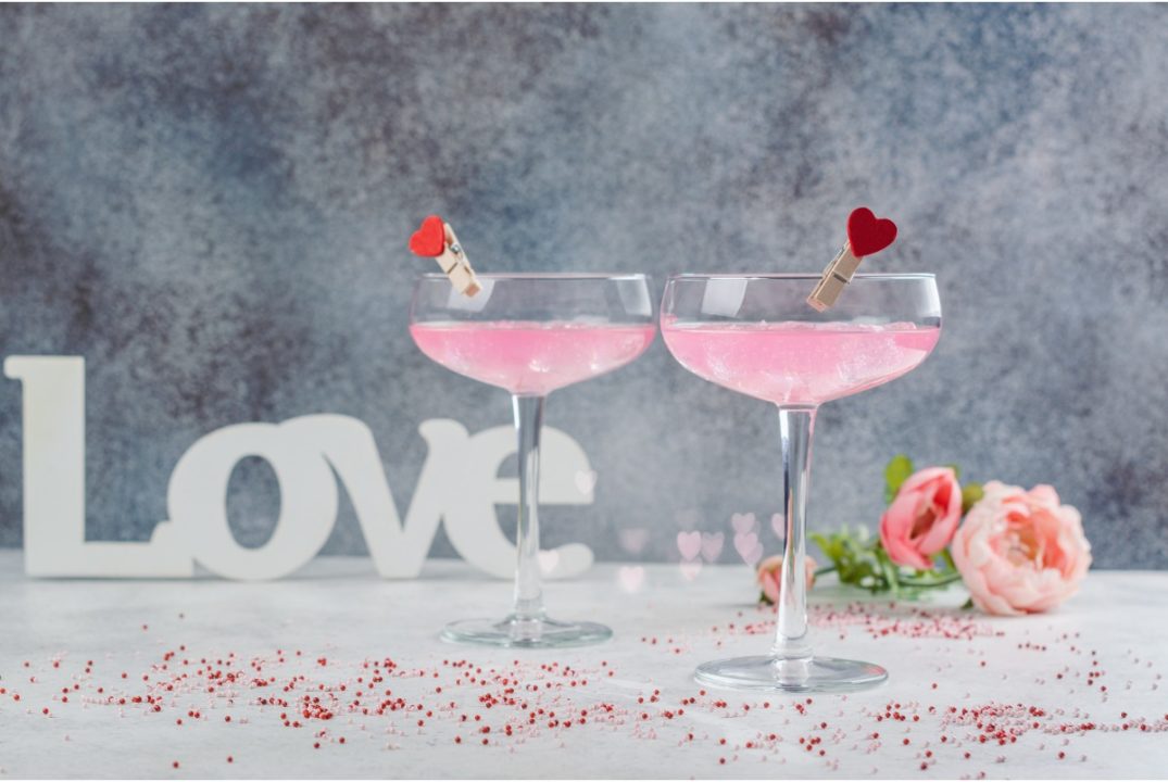 pink cocktails and flowers at valentine's day lunch
