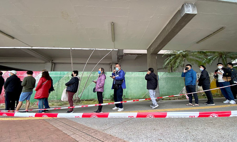hong kong residents queue for mandatory covid testing