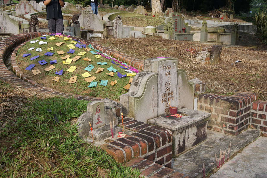 five colour papers on ancestors tomb during ching ming festival