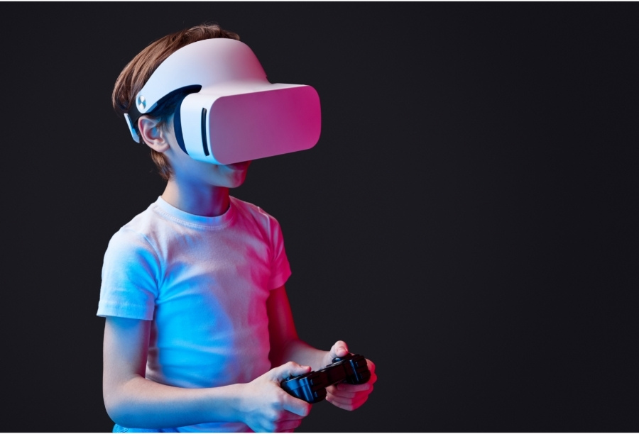child using VR headset and gaming controller
