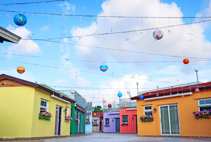 colourful houses at yau tam mei glamping
