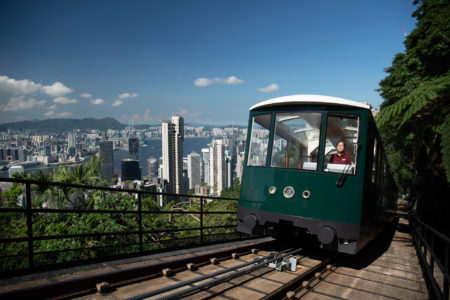 the peak tram with hong kong skyline