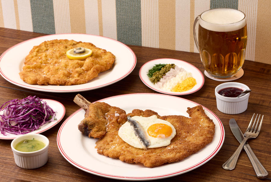 schnitzel with side dishes and beer from schnitzel & schnaps hk