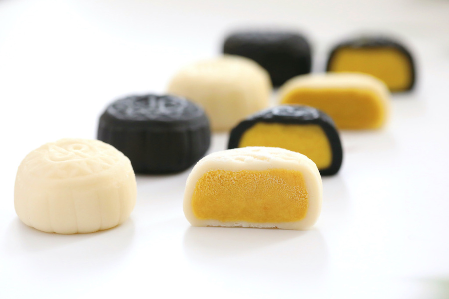 black and white durian custard filled mooncakes from yong fu