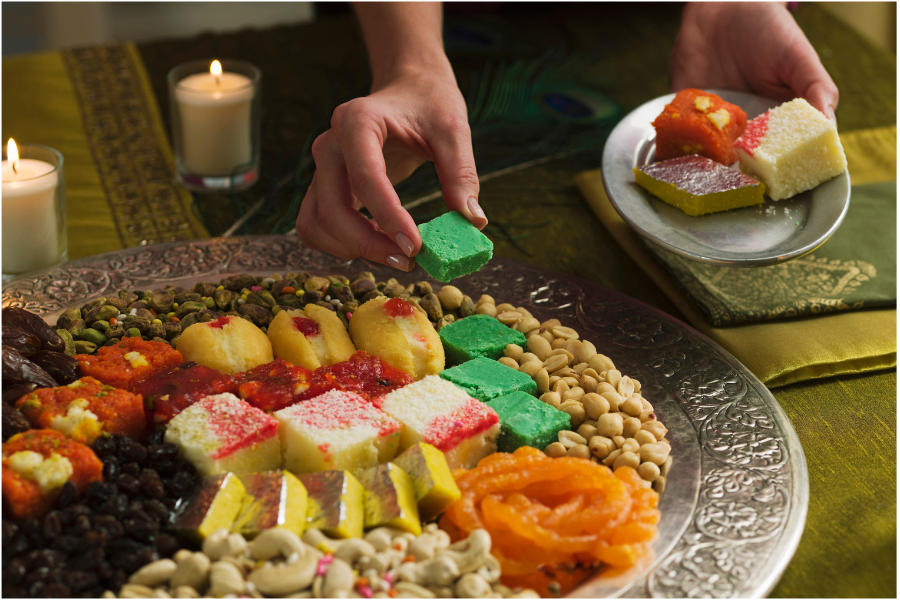 People usually serve an assortment of sweets and dried fruits for Diwali.
