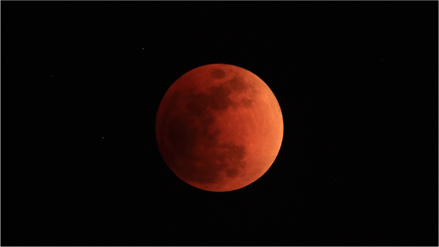 A total lunar eclipse in which the moon looks red.
