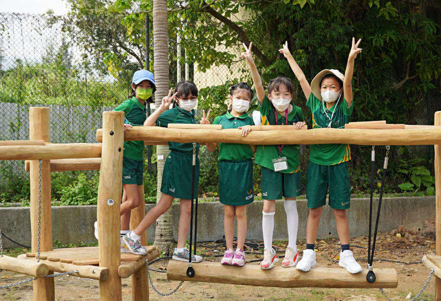 children at international college hong kong play on the outdoor playground
