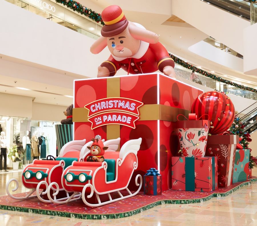 Santa’s sleigh at Pacific Place’s Christmas on Parade event. It includes a larger-than-life inflatable rabbit, Christmas ornaments, and presents.