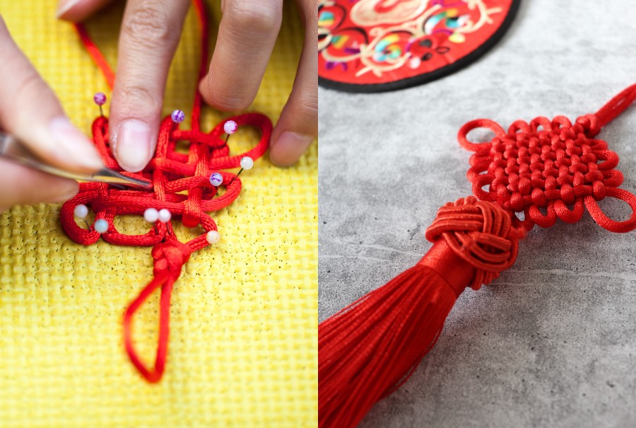 close up of hands making chinese knot for lunar new year
