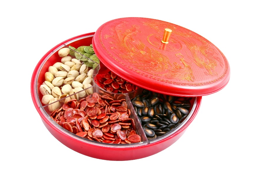 Auspicious candy box for chinese new year filled with nuts and sweets