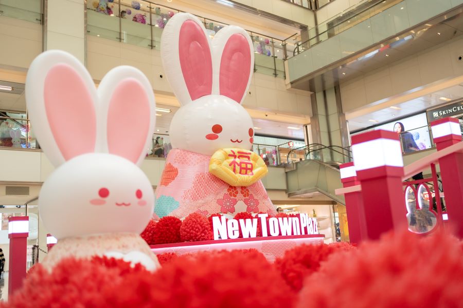 New Town Plaza's rabbits sit on a sea of flowers.