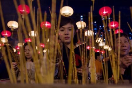 Incense offering at Wong Tai Sin Temple in Hong Kong.