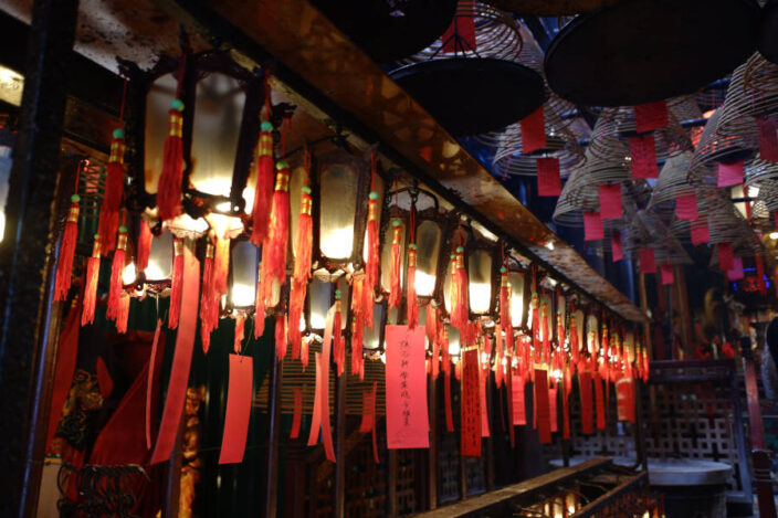 red papers hanging in man mo temple
