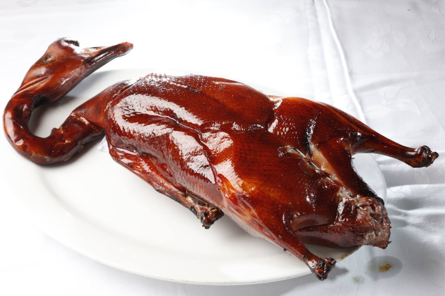 roasted geese on a white plate