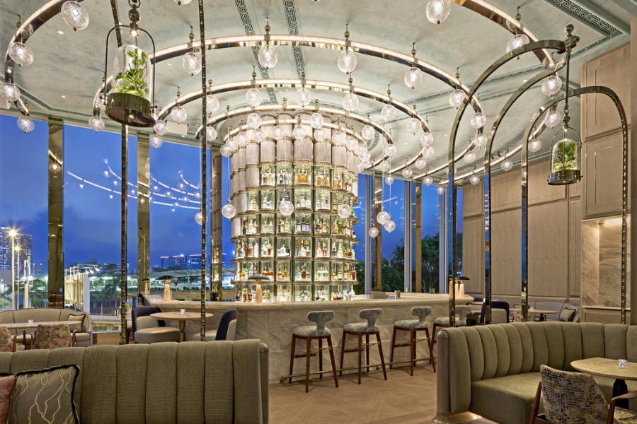 Argo is a high-ceiling bar filled with different spirits, with a backdrop of Central city view