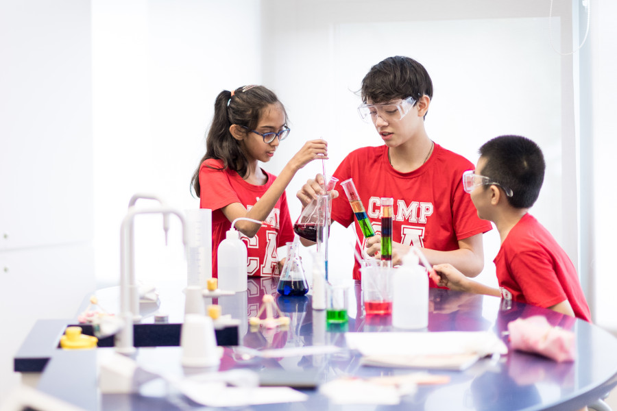 kids doing chemistry science experiments at camp asia's summer camp in hong kong