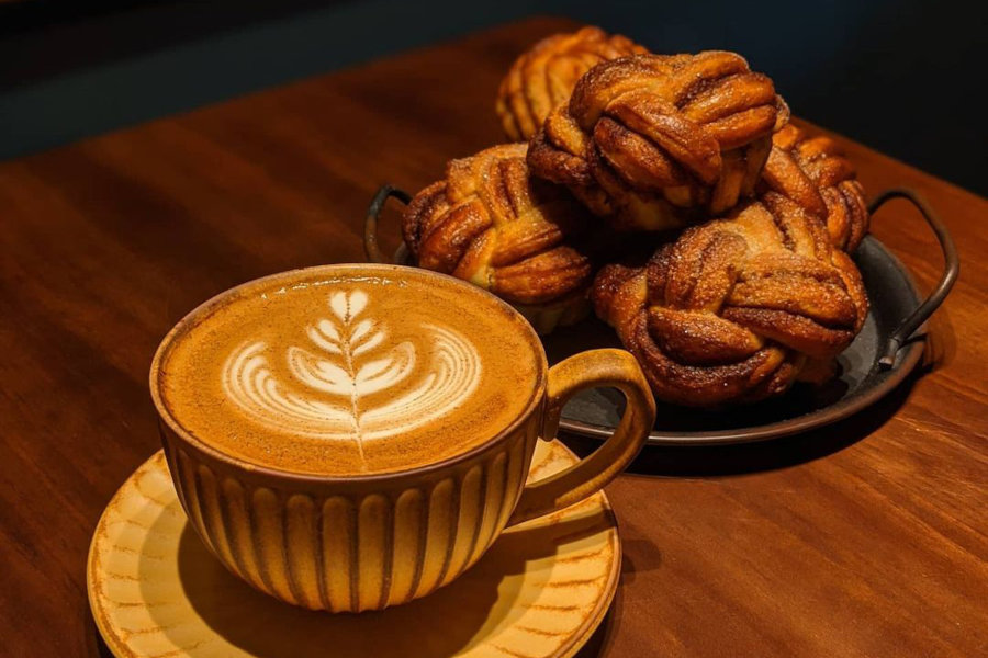 latte and a plate of pastries at passepartout brunch and coffee hong kong