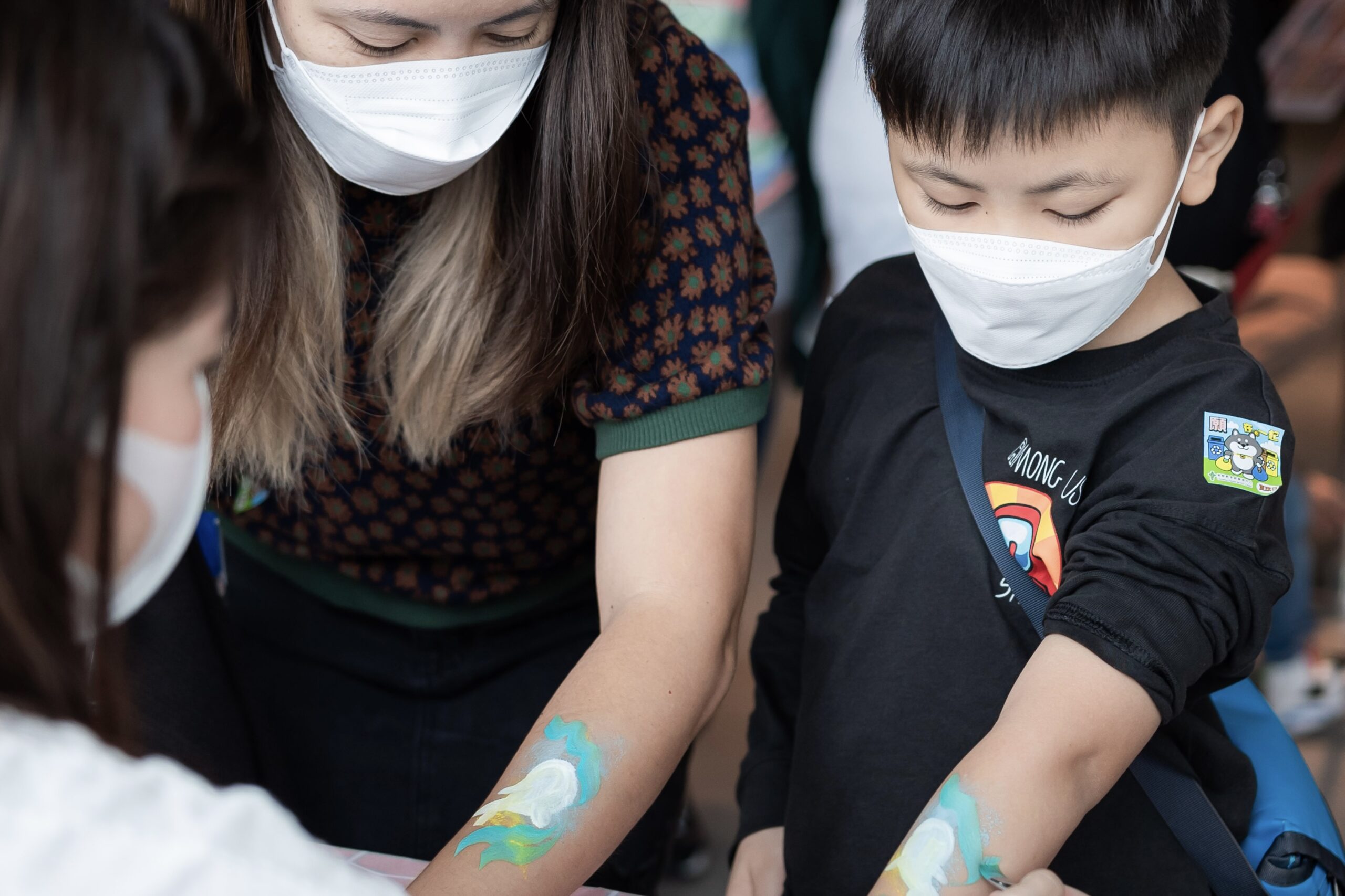 Visit the hand-painting booth to get an ocean-themed work of art on your arm.