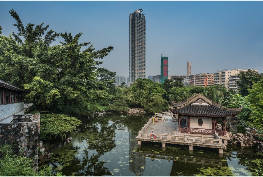 pond and pagoda in kowloon walled city park hong kong