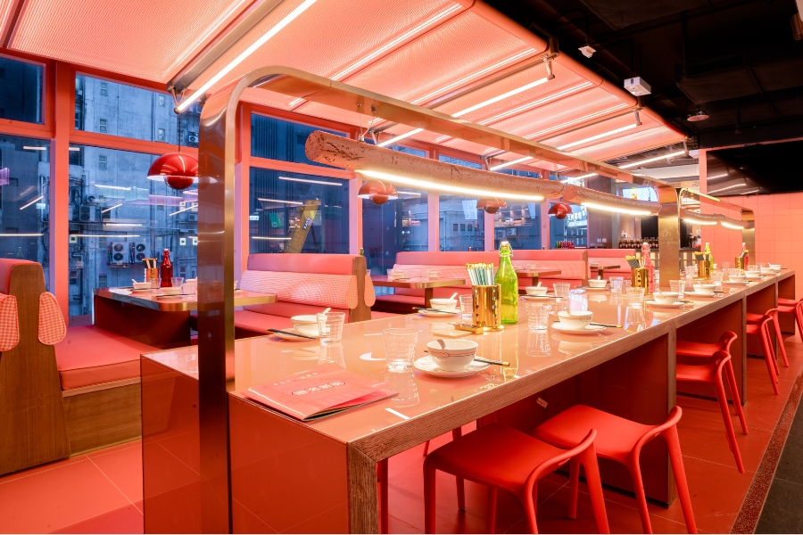 Pink and red interior decor at Soul Guide restaurant