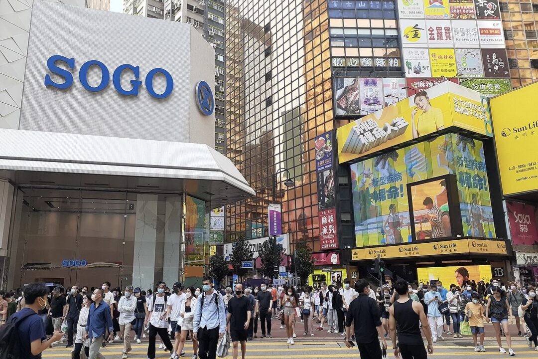 A busy street crossing in front of SOGO in Causeway Bay, Hong Kong.