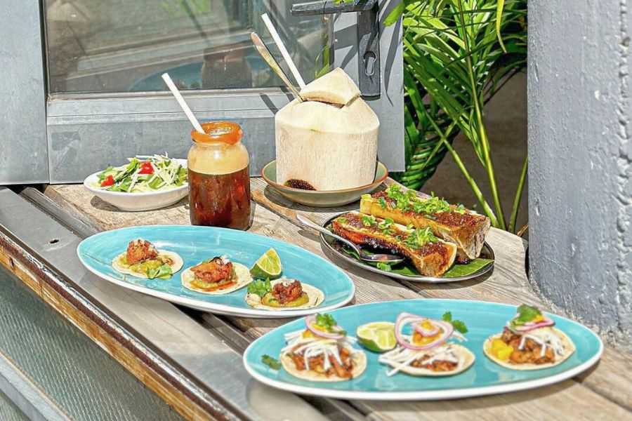 Enjoy fresh seafood and tasty tacos with a view of Repulse Bay beach at Limewood