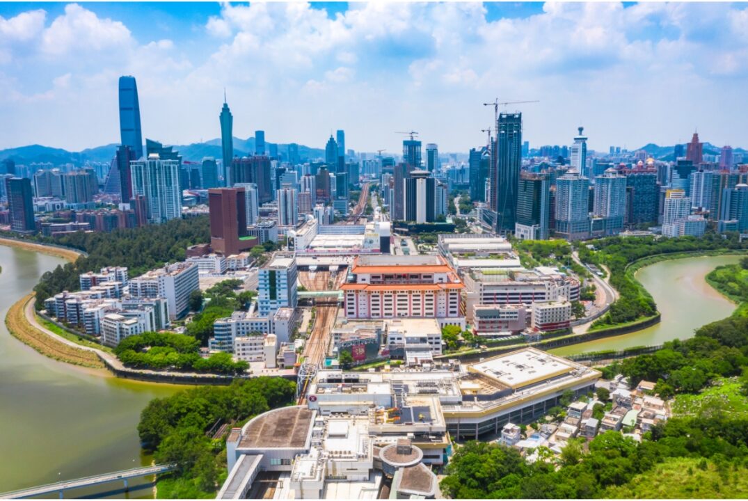 A view of Shenzhen with the Lo Wu MTR station on the southern bank of the Shenzhen River and the Luoho Port on the northern side of the river bank.