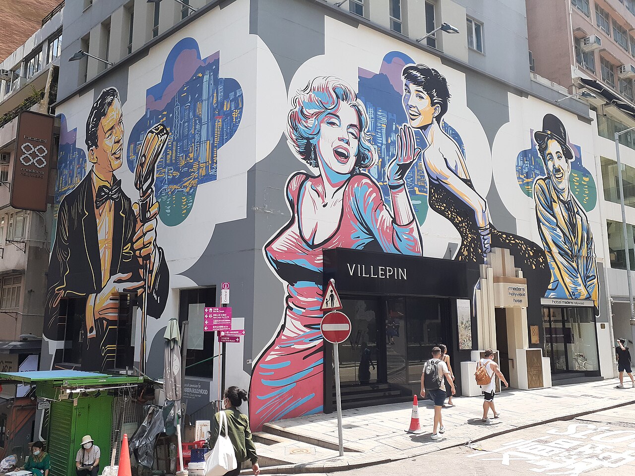 The pop art-style mural on the Hotel Madera Hollywood bears images of (from left to right) Frank Sinatra, Marilyn Monroe, Audrey Hepburn and Charlie Chaplin. The stars are set against the backdrop of Hong Kong's skyline.