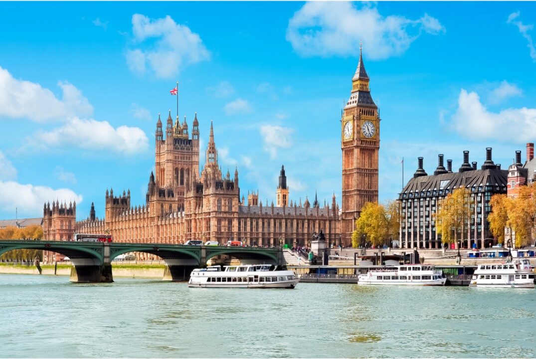 A view of the House of Parliament and Big Ben overlooking the Thames river in London.