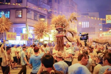 Tai Hang Fire Dragon Dance Returns After 4 Years For Mid-Autumn Festival 2023 Celebrations The Tai Hang Fire Dragon dance takes place in Hong Kong. The dragon, which is made out of incense sticks is held up by dancers and spun around, while spectators look on and try and photograph the dance.