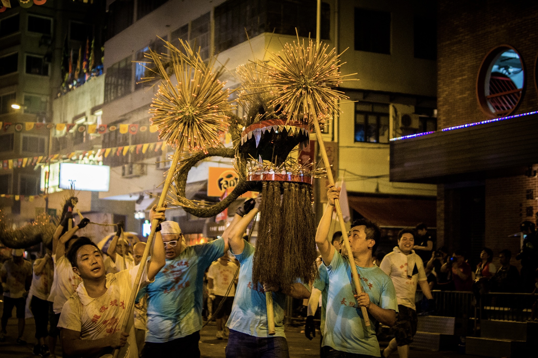 the fire dragon at tai hang in hong kong being held up by dragon dancers