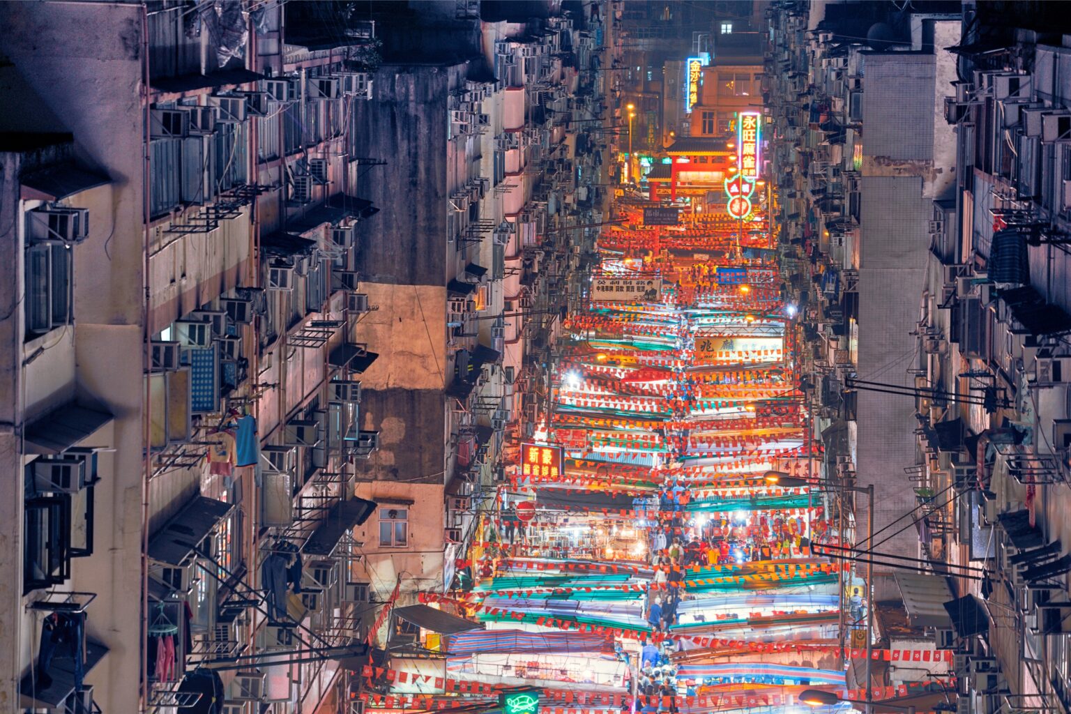an overhead view of temple night market in hong kong
